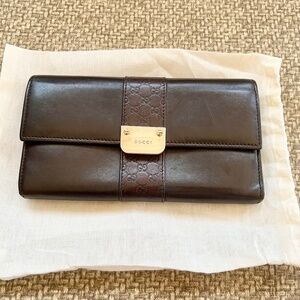 Authentic Gucci GG Embossed Leather Wallet, Brown